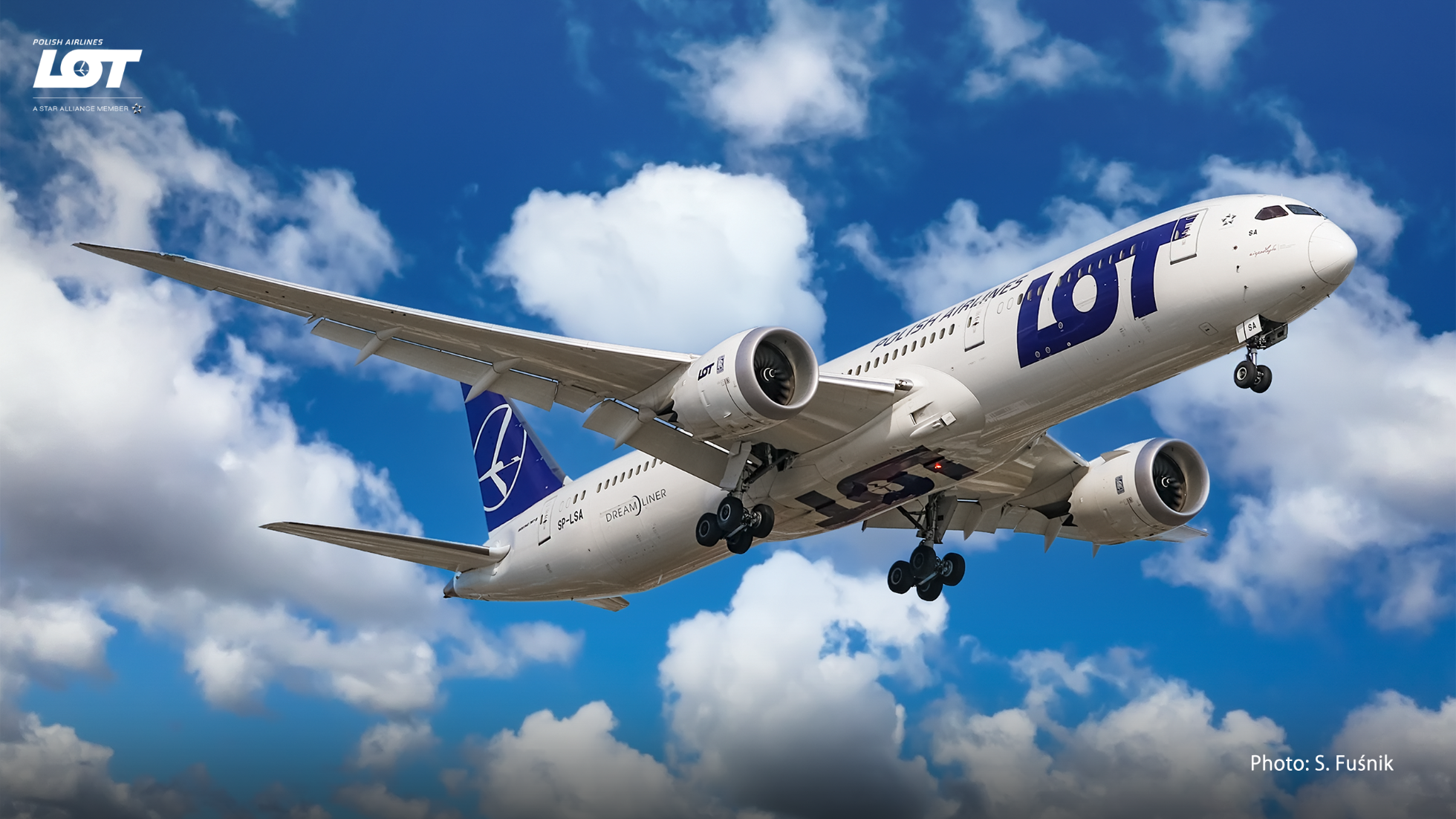 Passenger airplane against a sky with clouds.